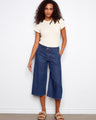The denim pants feature a stylish wide leg fit, offering both comfort and flair for any casual outing. By Charlie B.