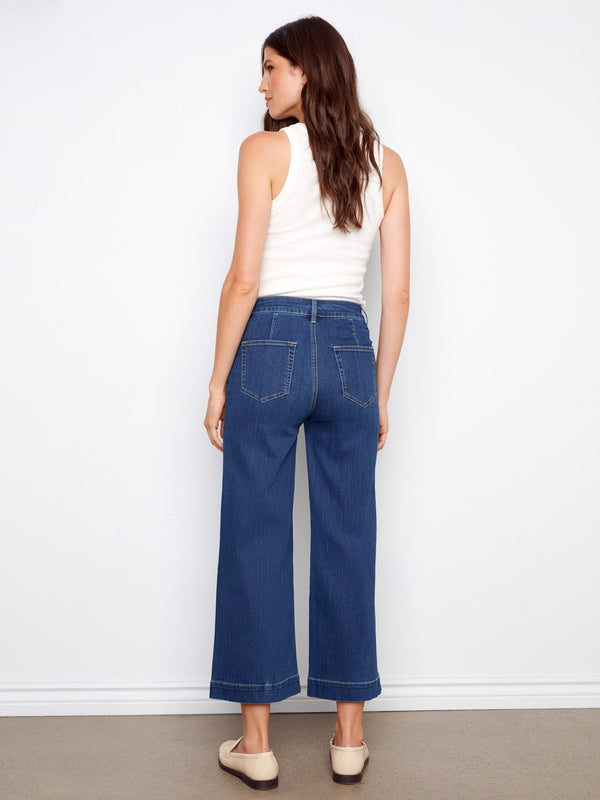 Designed with front patch pockets and back pockets, these jeans provide practical style. By Charlie B.