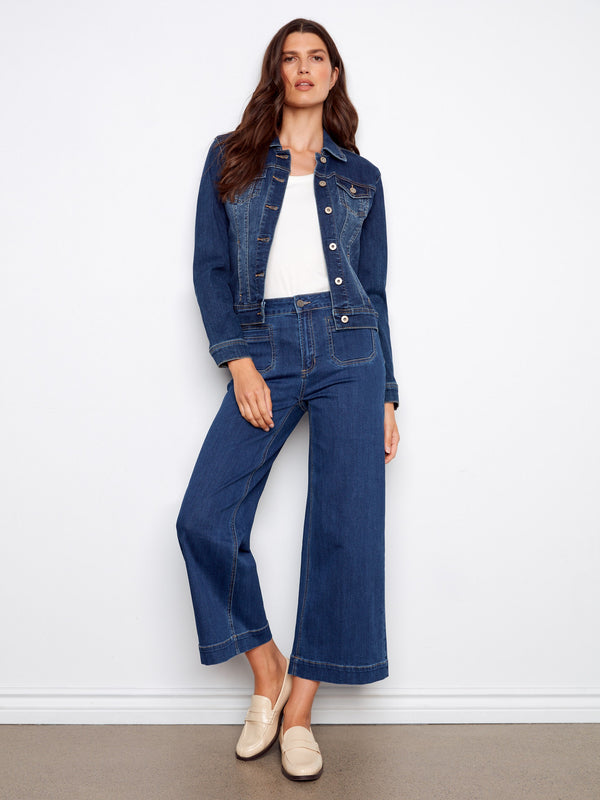 These flare fit jeans are made from stretch denim fabric, providing both comfort and style in one piece. By Charlie B.