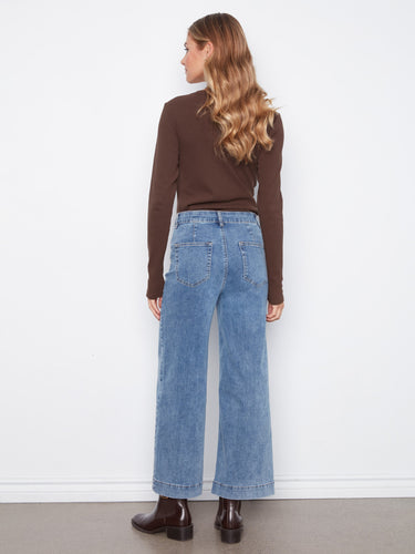 Designed with patch pockets, these jeans combine functionality with fashion. By Charlie B.