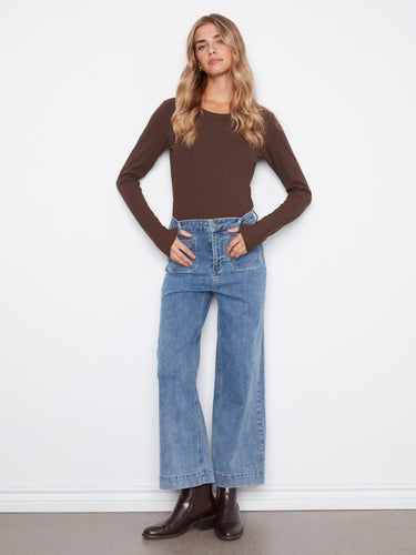 Featuring a regular rise, these jeans provide a classic fit that flatters all body types. By Charlie B.