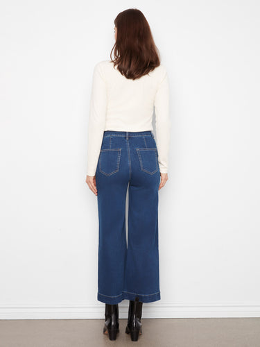 Classic patch pockets add functionality and flair to these versatile denim pants, perfect for any casual occasion by Charlie B.