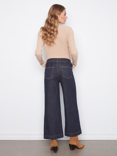 Chic stretch denim jeans in deep blue, complete with stylish horsebit accents on the front pockets by Charlie B.