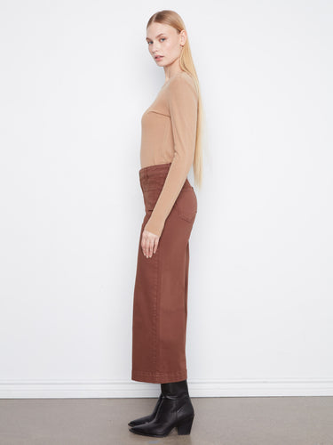 With zip fly and button closure, these pants ensure comfort and style. Designed in flexible stretch twill by Charlie B.