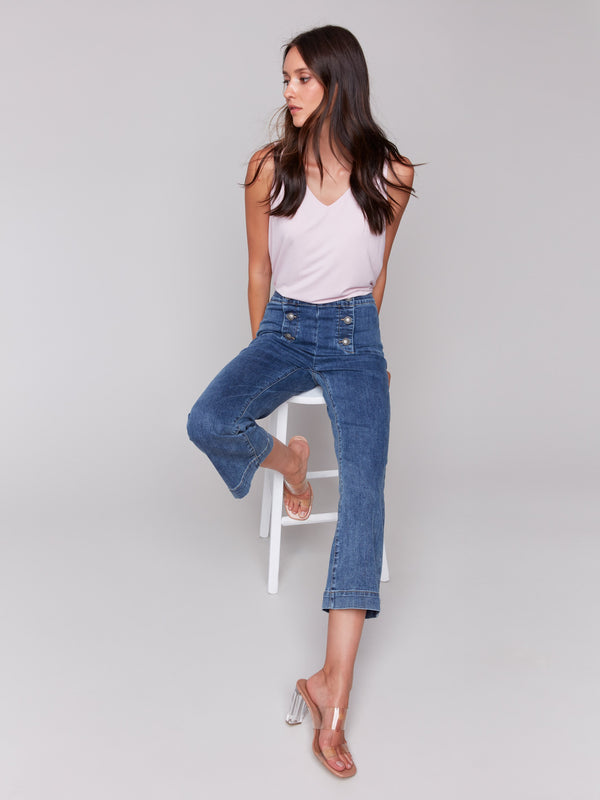 Medium blue pull-on flare jeans with cropped length design by Charlie B.