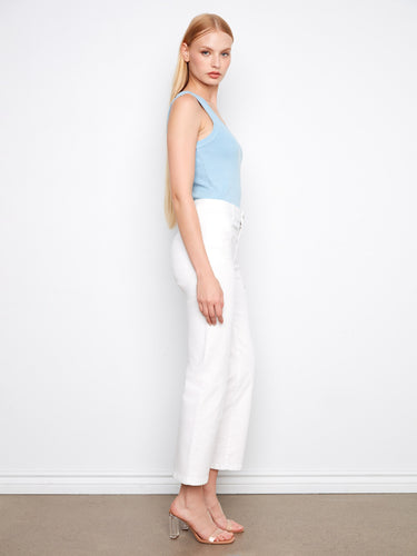 White jeans in a cropped length with stylish eyelet-embroidered pockets for flair by Charlie B.