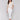 White cropped jeans with slim fit and side slit detail by Charlie B.