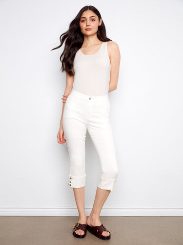 White cropped jeans designed with a regular rise and classic five-pocket style for everyday wear by Charlie B.