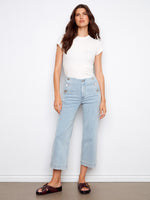 These jeans feature a wide leg design, offering a relaxed and stylish look for any occasion. By Charlie B.