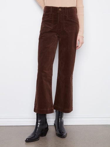 These ankle length brown pants feature patch pockets, adding a functional touch to the stylish design by Charlie B.