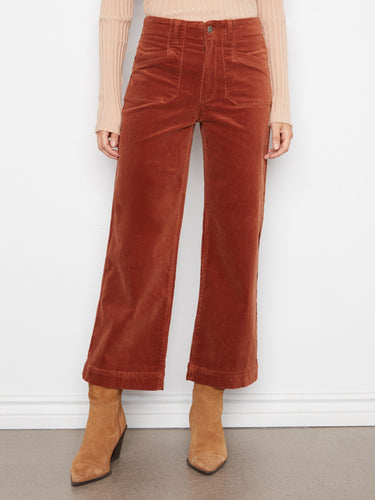 Featuring a button closure, these wide leg cropped pants are both functional and fashionable by Charlie B.