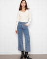 Medium blue jeans with wide leg design, featuring rectangular patch pockets and regular rise for a chic look by Charlie B.