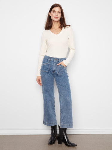 Medium blue jeans with wide leg design, featuring rectangular patch pockets and regular rise for a chic look by Charlie B.