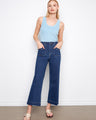 Indigo jeans featuring wide-leg design and stretch denim for comfort, complete with button closure by Charlie B.