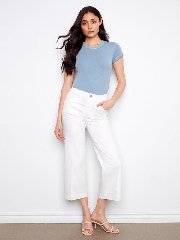White cropped wide-leg jeans featuring stretch twill fabric for added comfort by Charlie B.