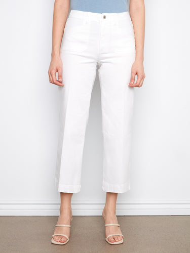 These white jeans with rectangular patch pockets offer a stylish and practical touch by Charlie B.
