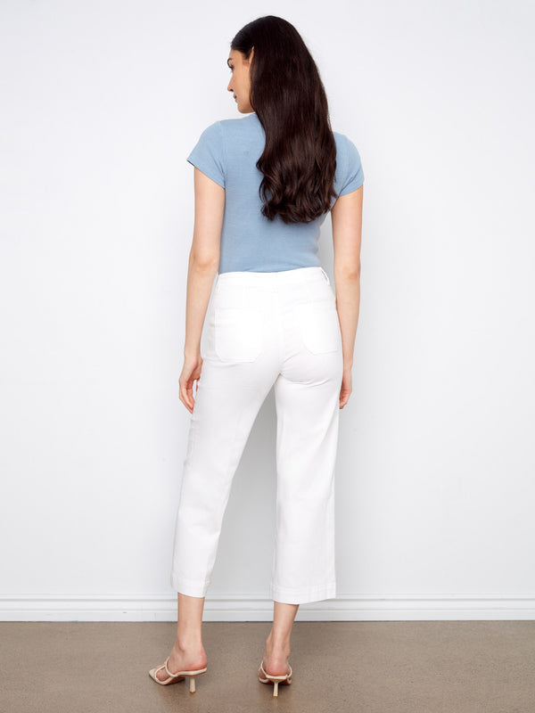 Embrace the chic look with wide-leg design in these versatile white cropped jeans by Charlie B.