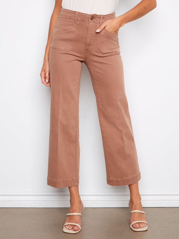 Cropped length pants featuring rectangular patch pockets for added functionality and modern design. A versatile wardrobe staple by Charlie B.