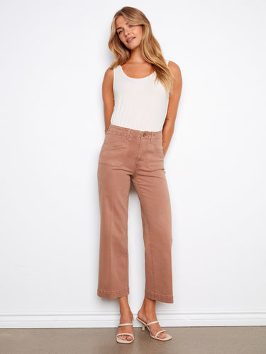 Stylish cropped length pants designed with rectangular patch pockets, combining fashion and utility seamlessly. By Charlie B.