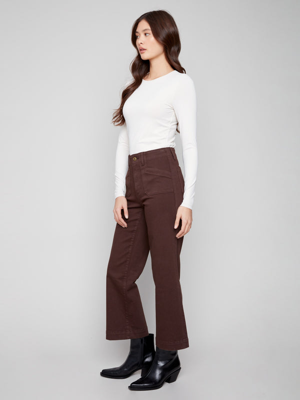 Stylish mocha pants in stretch twill fabric with back patch pockets, offering both comfort and functionality by Charlie B.