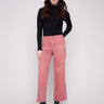 Primrose-colored pants feature a stylish wide leg design, perfect for a chic and comfortable look by Charlie B.