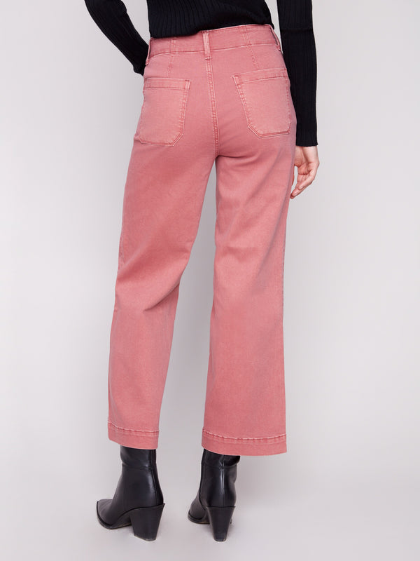 The regular rise of these primrose-colored pants ensures a flattering fit for any occasion by Charlie B.