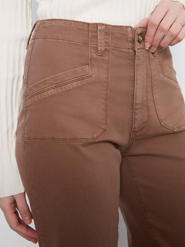 Designed with a regular rise, these pants provide a flattering fit that complements various tops. By Charlie B.