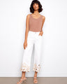White cropped jeans with a wide fit and floral embroidery, featuring a regular rise and stretch denim by Charlie B.