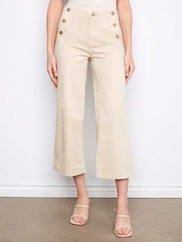 These beige wide-leg cropped pants come with convenient slash pockets and a stylish design by Charlie B.