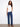 Elegant white top crafted from 100% cotton, highlighted by delicate shoulder embroidery by Charlie B.