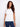 Casual yet refined, this white top features a crew neckline and embroidered accents on the shoulders by Charlie B.