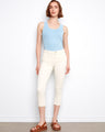 These pants feature a slim fit that enhances the silhouette, paired with a soft blue tank top for a casual look. By Charlie B.
