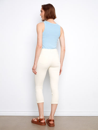 Cuffed hem adds detail to these cream pants, creating an elegant look with the soft blue top. Perfectly styled by Charlie B.