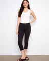 Black pants with a slim fit and stretch twill fabric, perfect for versatile styling. By Charlie B.