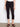 These black pants feature a cuffed hem, offering a chic and modern look for any occasion. By Charlie B.