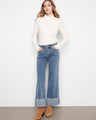 Denim jeans featuring a wide leg design and cuffed hem, offering a stylish touch to any outfit by Charlie B.