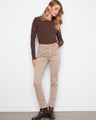 Beige pants with a slim leg design, perfect for a sleek and modern look. Crafted from stretch twill fabric by Charlie B.