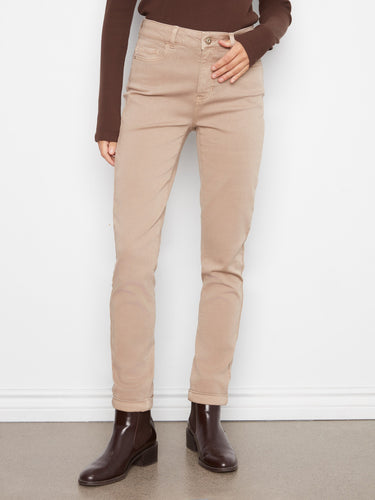 These beige pants feature a stylish cuffed hem, adding a touch of elegance to your everyday wardrobe by Charlie B.
