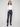 Navy ponte pants featuring straight leg design and cuffed hems, offering a sleek silhouette by Charlie B.