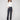 Navy ponte pants featuring straight leg design and cuffed hems, offering a sleek silhouette by Charlie B.
