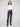 Navy ponte pants featuring straight leg design and cuffed hems, offering a sleek silhouette by Charlie B.