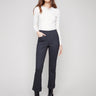 Navy ponte pants featuring straight leg design and cuffed hems, offering a sleek silhouette by Charlie B.