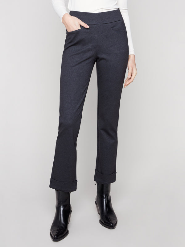 Ankle-length navy ponte pants with welt pockets on each side for added functionality by Charlie B.