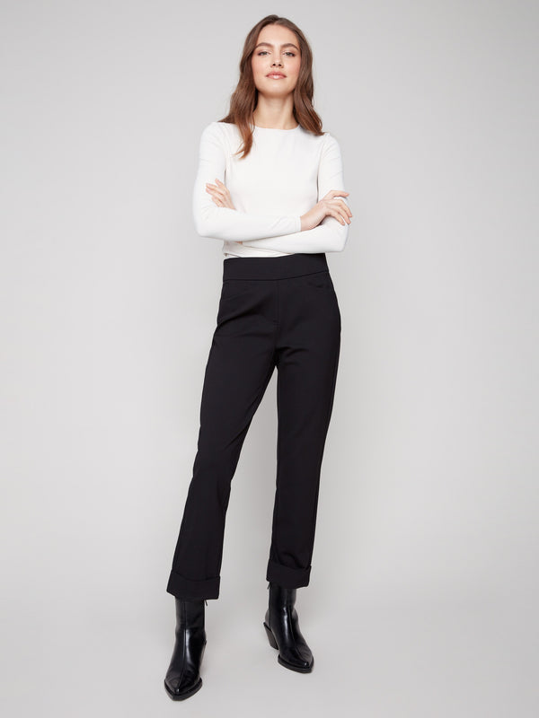Black ponte pants featuring straight legs and a sleek design, ideal for versatile styling by Charlie B.