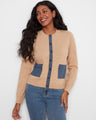 Beige cardigan featuring a crew neck design, paired with denim jeans for a casual look. Made from 100% cotton by Charlie B.