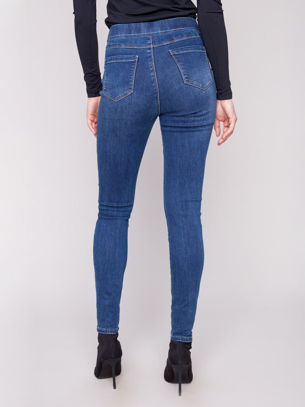 The pull-on waistband ensures ease of wear while maintaining a sleek look in these jeans by Charlie B.