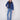 Blue denim quilted puffer jacket with 100% cotton exterior, featuring a sleek high collar by Charlie B.
