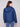 Stylish blue denim puffer jacket showcasing its removable hood and elegant design by Charlie B.