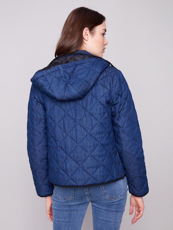 Stylish blue denim puffer jacket showcasing its removable hood and elegant design by Charlie B.