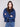Puffer jacket in classic blue denim, highlighted by its snap button front closure for ease by Charlie B.